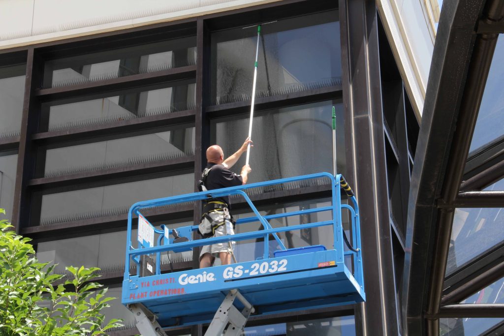 Using Lift to Clean High to Reach Windows